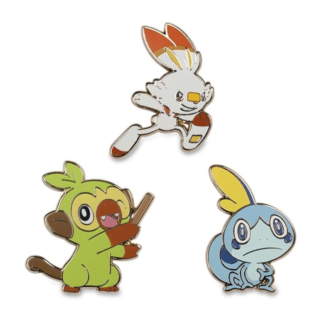 3f30de20-15ad-5a2f-9d67-7dce6011a99c-1024x1024-1.jpg Grookey, Scorbunny & Sobble Pokémon Pins (3-Pack) - Image 1